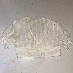 white eyelet crop top with puff sleeve